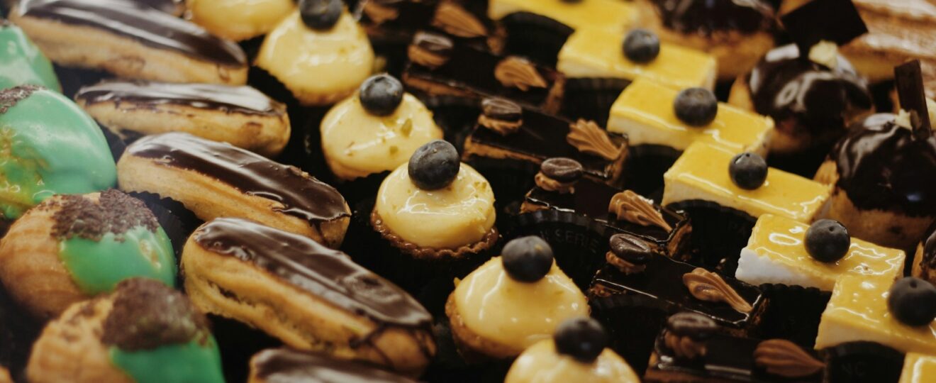 a close up of a tray of cookies and pastries
