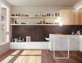 a kitchen with a counter, shelves, and a bar