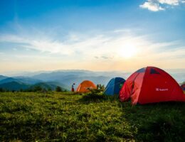 Photo of Pitched Dome Tents Overlooking Mountain Ranges