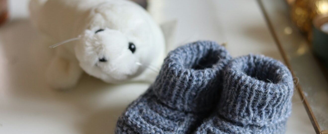 white bear plush toy on white table