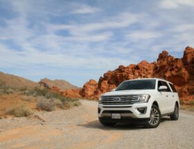 parked white Ford Explorer SUV