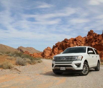 parked white Ford Explorer SUV