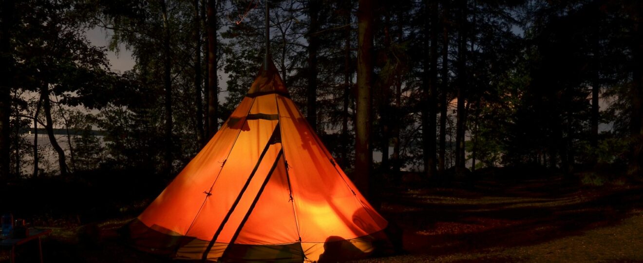 camping tent in forest during night