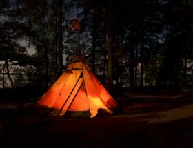 camping tent in forest during night