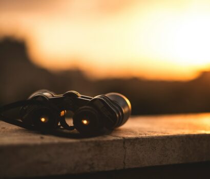 close-up selective focus photo of black binoculars