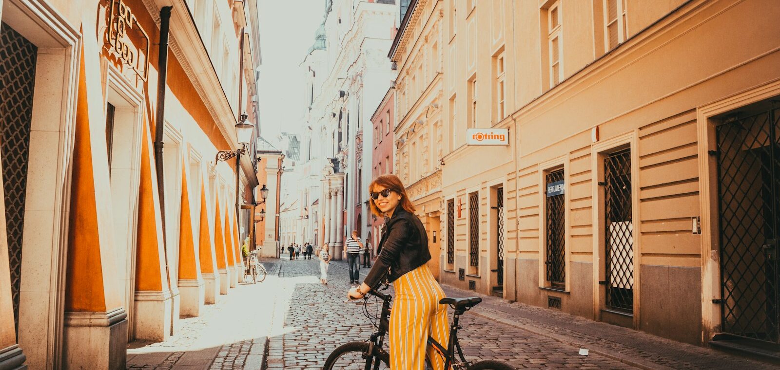 woman riding black hardtail bike