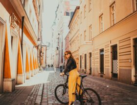 woman riding black hardtail bike