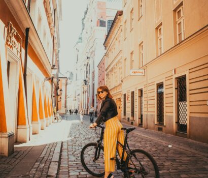 woman riding black hardtail bike