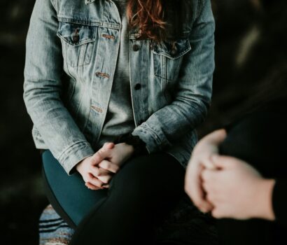 woman wearing gray jacket